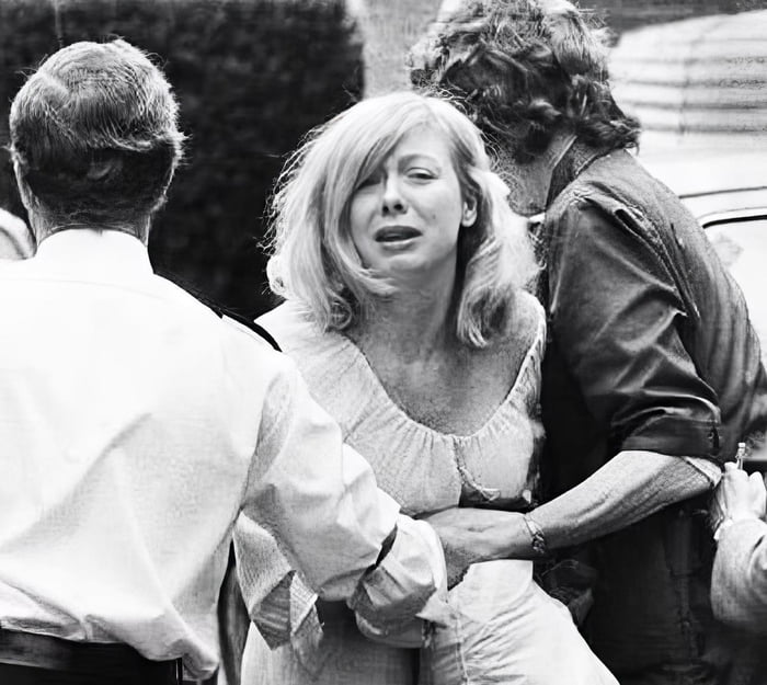 Former Miss Wyoming winner Joyce McKinney being arrested by police after kidnapping Mormon missionary Kirk Anderson from his church, forcing him to be her sex slave for 3 days. 1977