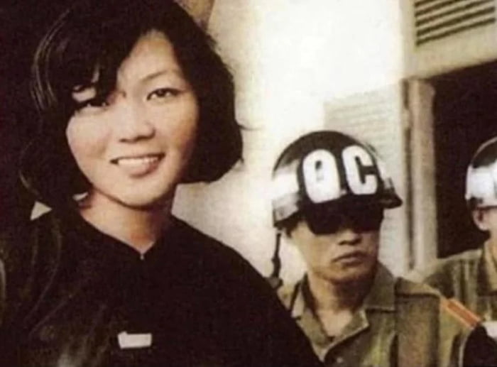 Vu00f5 Thi Thang smiling after being sentenced to 20 years hard labour in a prison camp by the South Vietnamese govt. After being sentenced she reportedly smiled at the judge and said `20 years? Your government won’t last that long